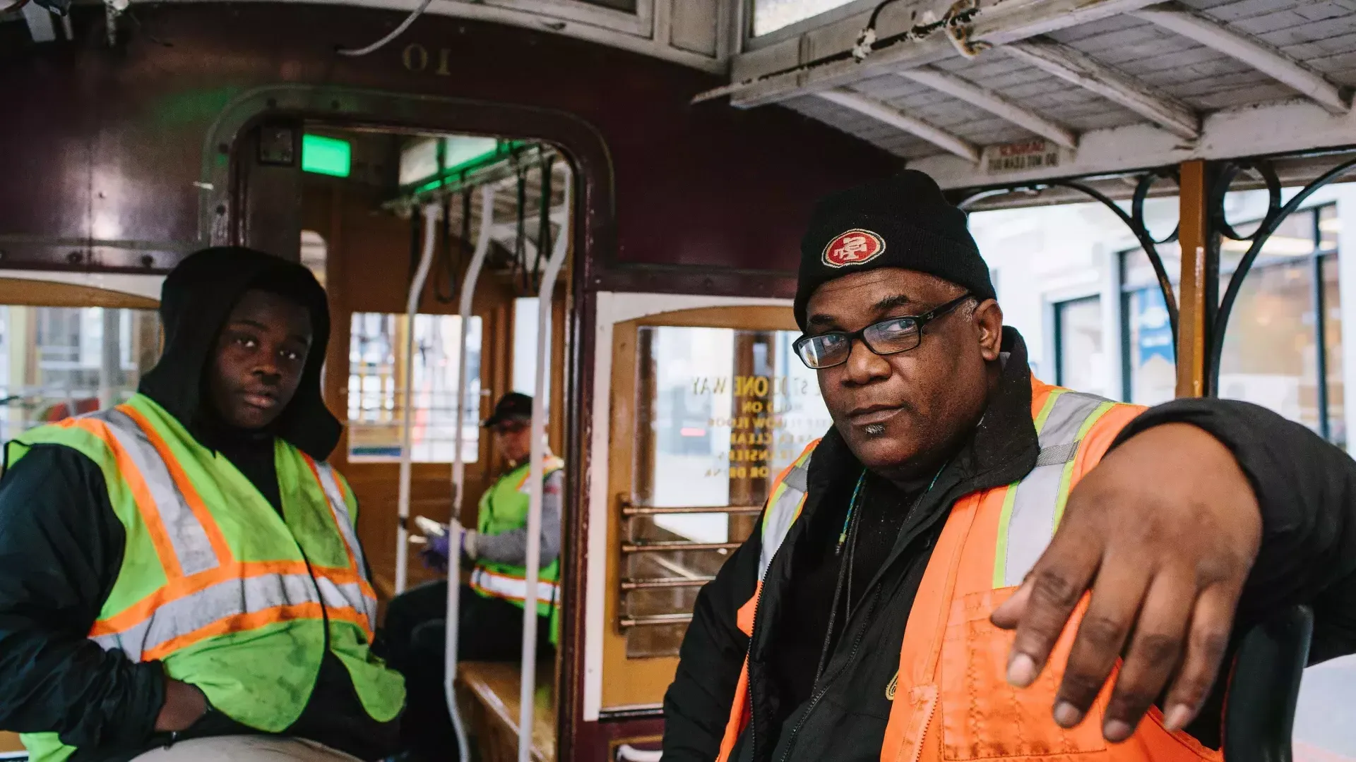 Ellis Cato and his son on a cable car.